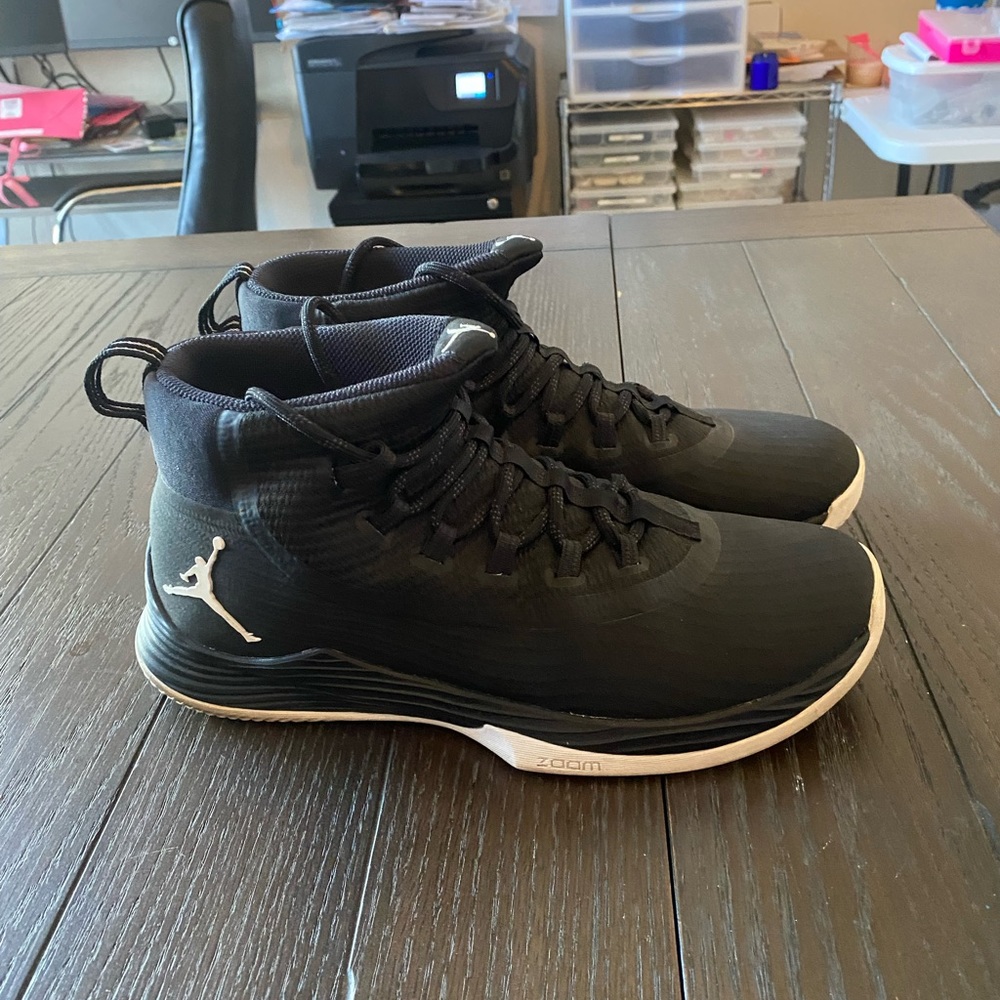 Mens Jordan’s size 11.  Black with white Jordan logo.